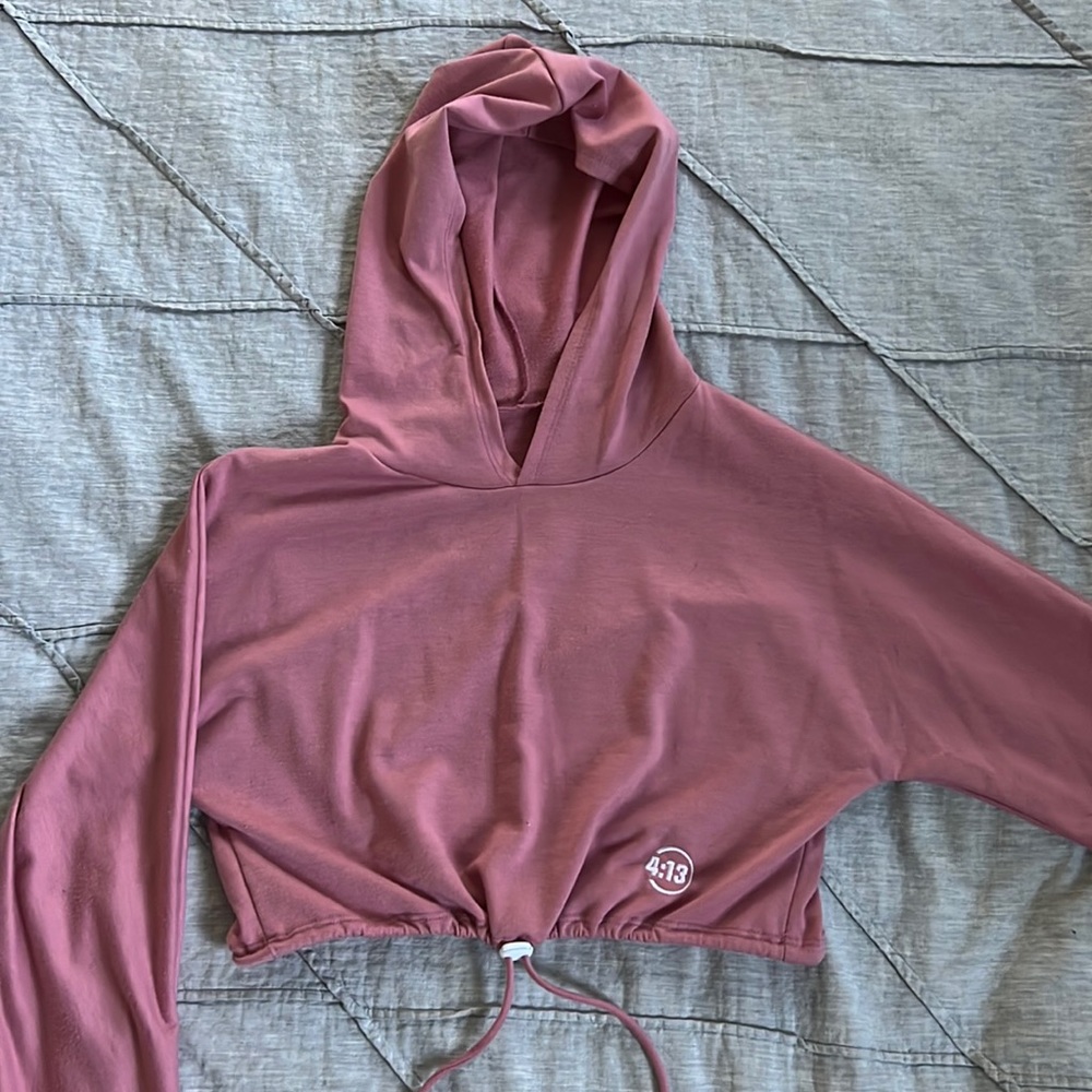 4:13 crop top sweatshirt with pull string at waist.
